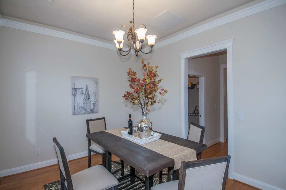 This is an example of a contemporary dining room in Charleston.