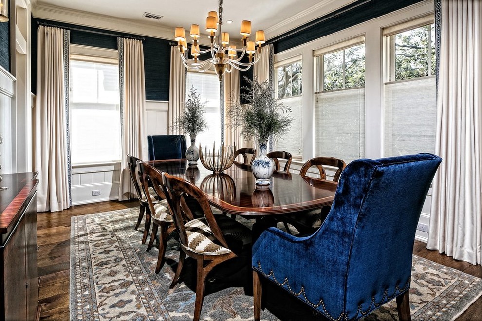 Inspiration for a mid-sized craftsman dark wood floor and brown floor enclosed dining room remodel in Charleston with blue walls and no fireplace