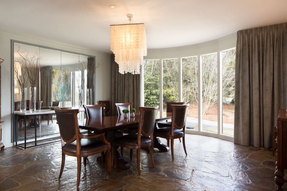 Dining room - large 1950s slate floor dining room idea in Birmingham with white walls and no fireplace