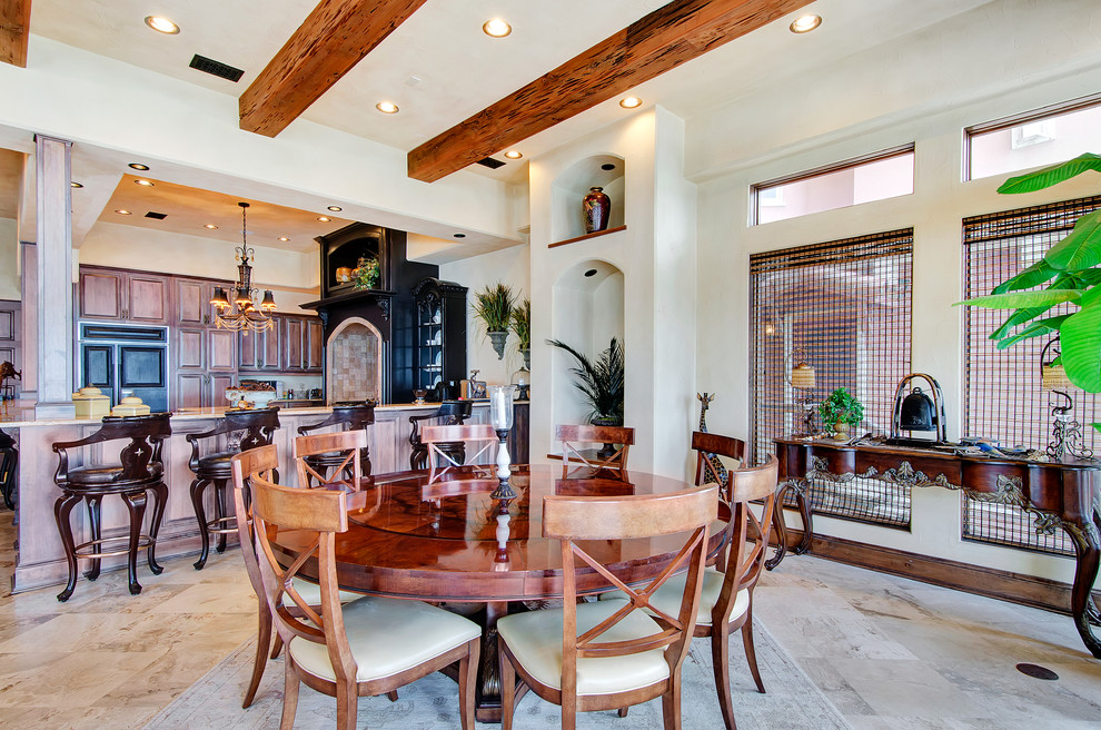 Photo of a mediterranean open plan dining room in Miami.