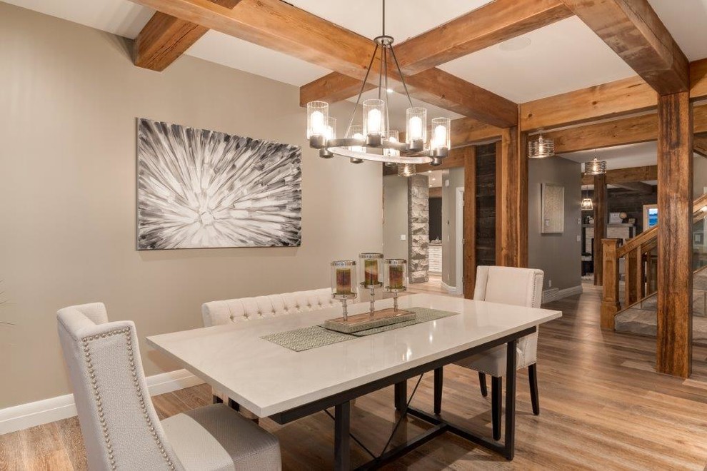 This is an example of a medium sized rustic open plan dining room in Calgary with beige walls, medium hardwood flooring and no fireplace.