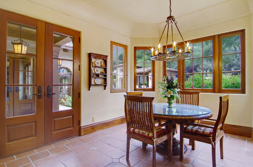 Classic dining room in San Francisco with beige walls, terracotta flooring and no fireplace.