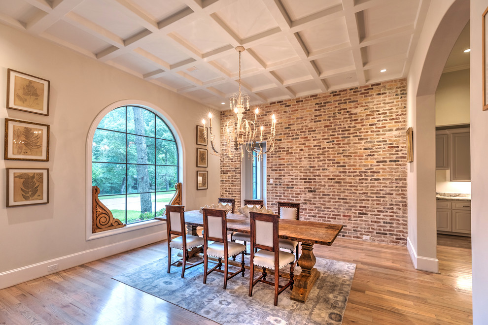 Dining room - traditional light wood floor dining room idea in Houston with beige walls