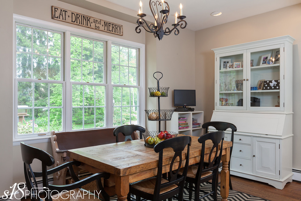 Inspiration for a mid-sized timeless medium tone wood floor dining room remodel in Philadelphia with beige walls