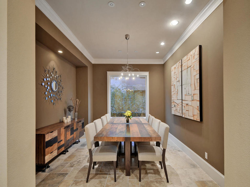 Example of a transitional enclosed dining room design in Austin with brown walls and no fireplace
