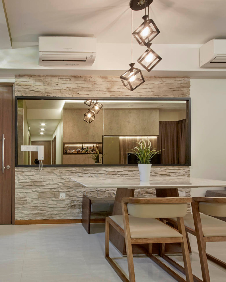 Medium sized contemporary dining room in Singapore with beige walls and porcelain flooring.
