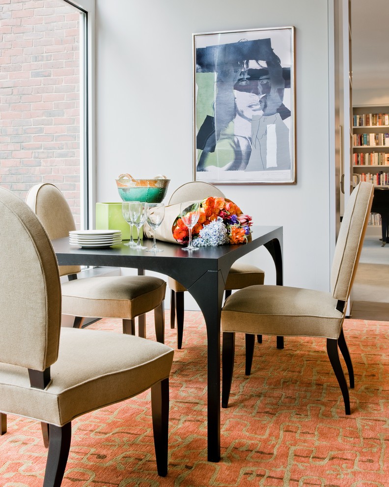 Inspiration for a contemporary dining room in Boston with white walls.