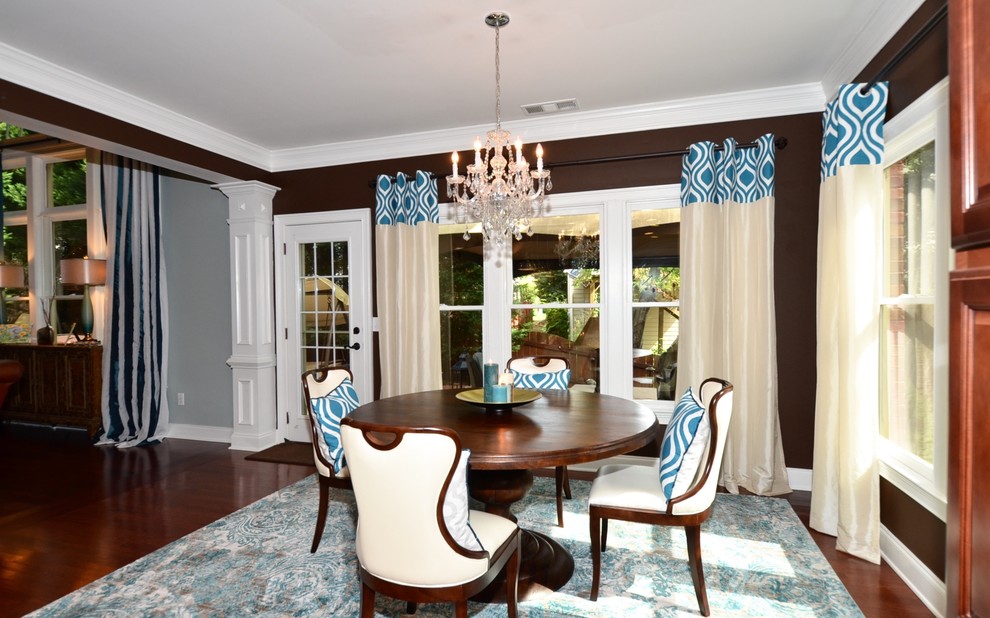 Inspiration for a large retro dining room in Atlanta with blue walls and carpet.