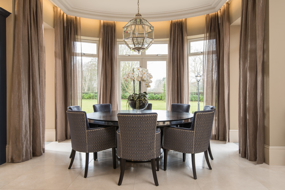 Classic dining room in London with beige walls and beige floors.