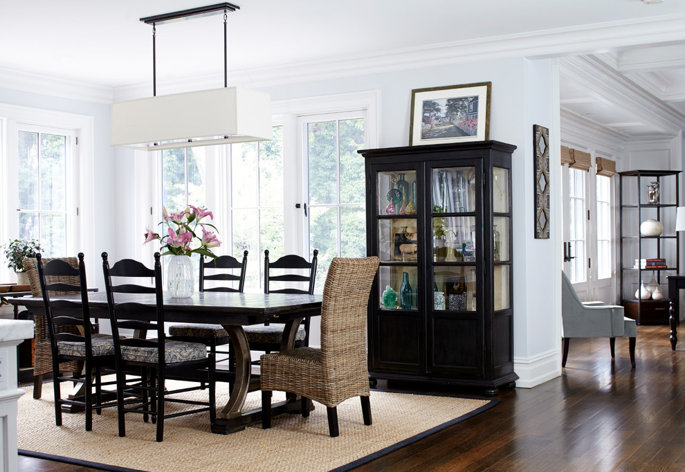 Example of a mid-sized classic dark wood floor great room design in New York with white walls