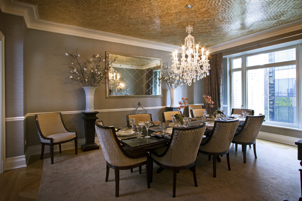 Elegant dark wood floor and beige floor dining room photo in Boston with gray walls