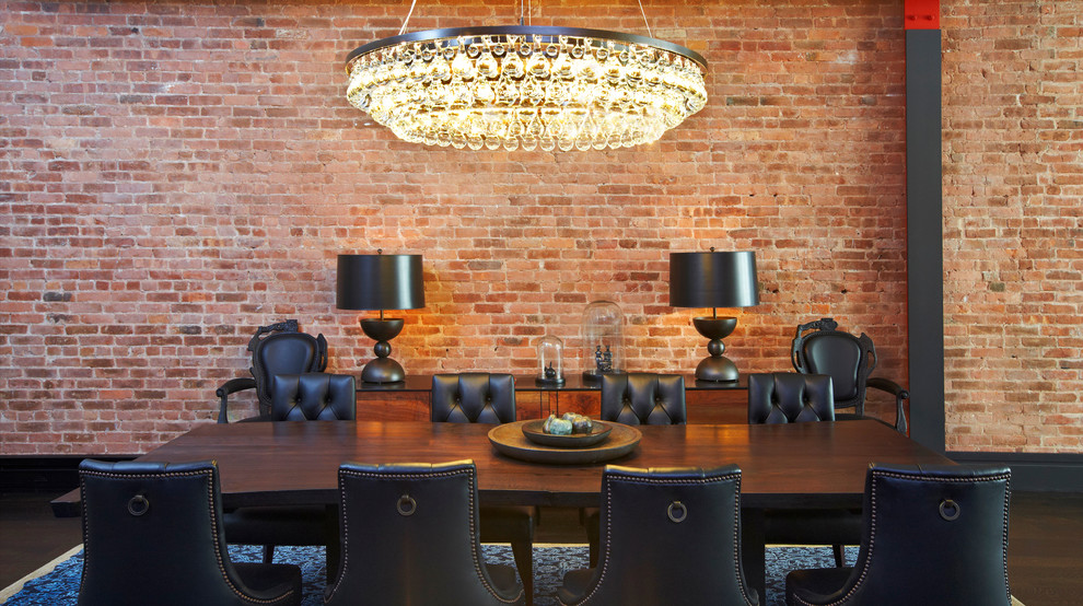 Design ideas for an urban dining room in New York with dark hardwood flooring.