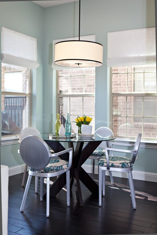 Dining room - transitional dark wood floor dining room idea in Dallas with blue walls