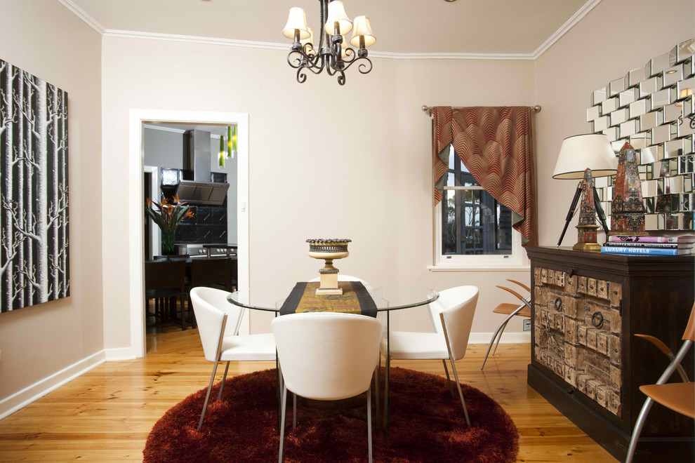 Example of an eclectic dining room design in Adelaide