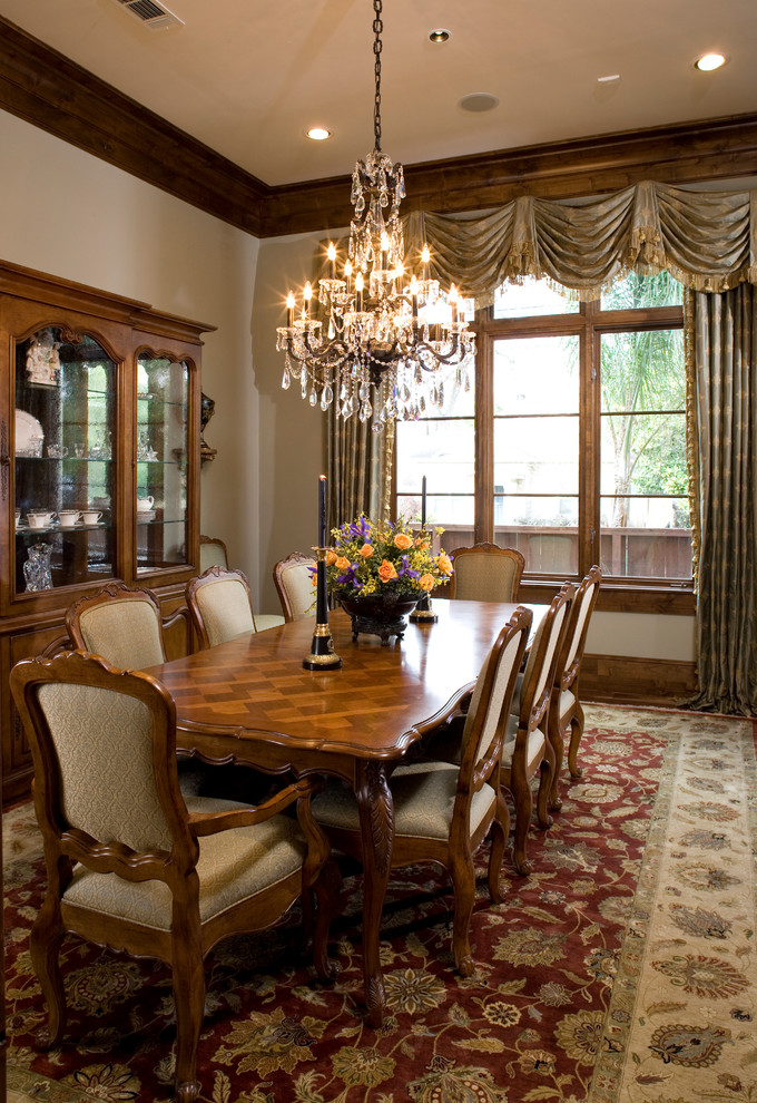 Photo of a traditional dining room in Houston with beige walls.