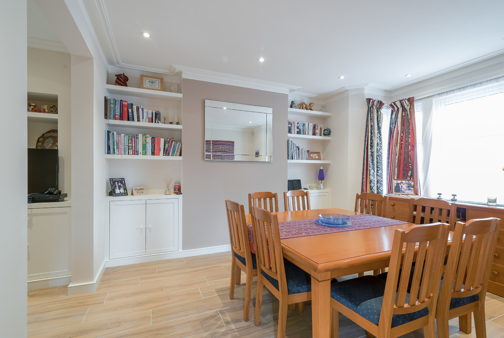 Photo of a contemporary dining room in London with ceramic flooring and multi-coloured floors.