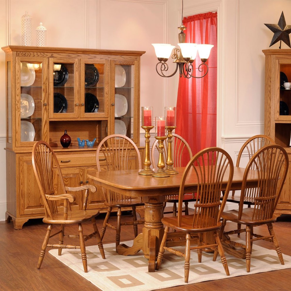 This is an example of a medium sized classic kitchen/dining room.