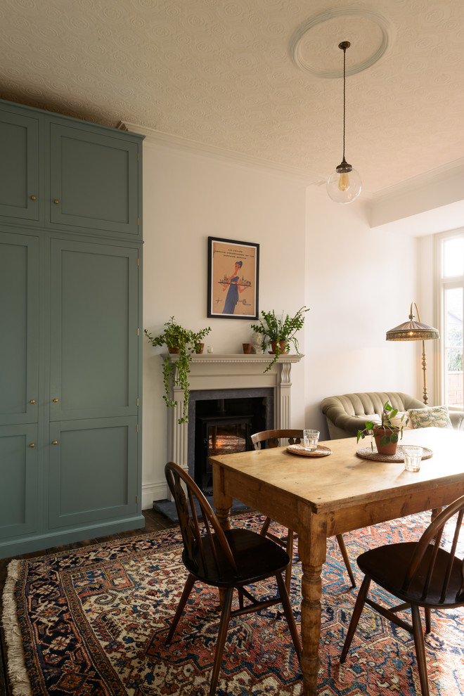 Design ideas for a scandi dining room in Other with feature lighting.