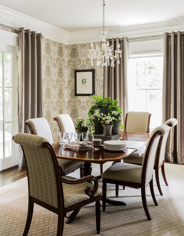 Classic dining room in Boston with beige walls, dark hardwood flooring and brown floors.