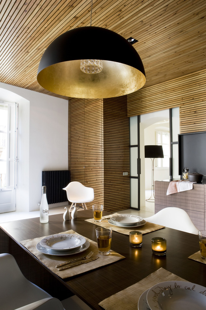 Design ideas for a medium sized contemporary dining room in Barcelona with white walls.