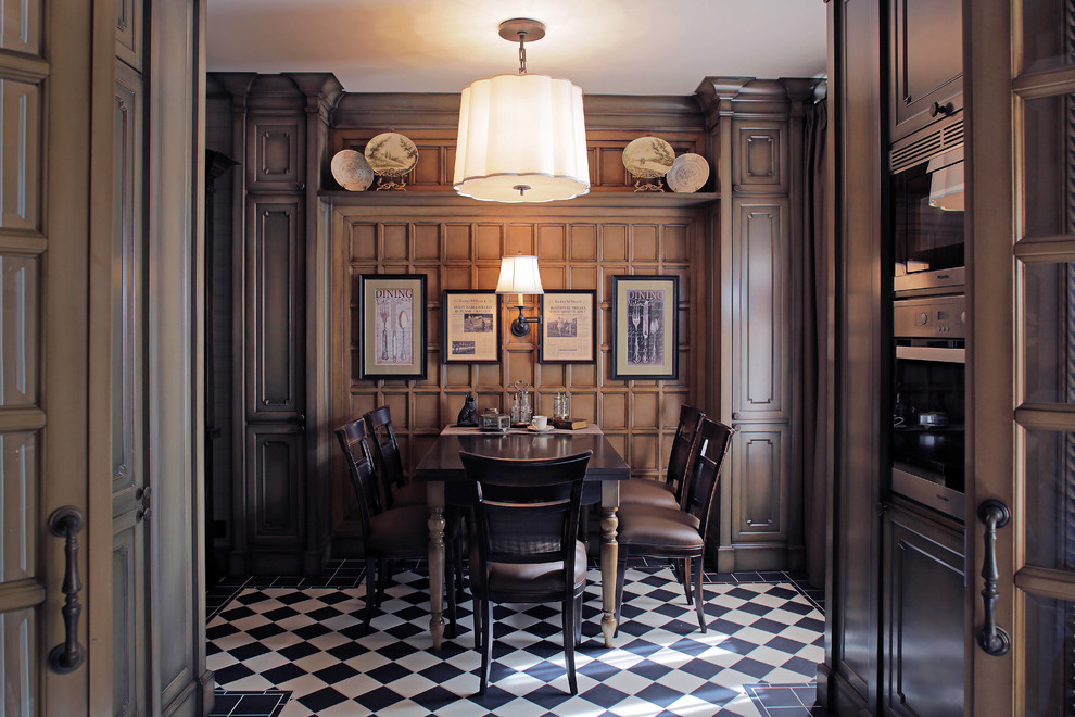 Photo of a traditional dining room in Moscow with brown walls and feature lighting.