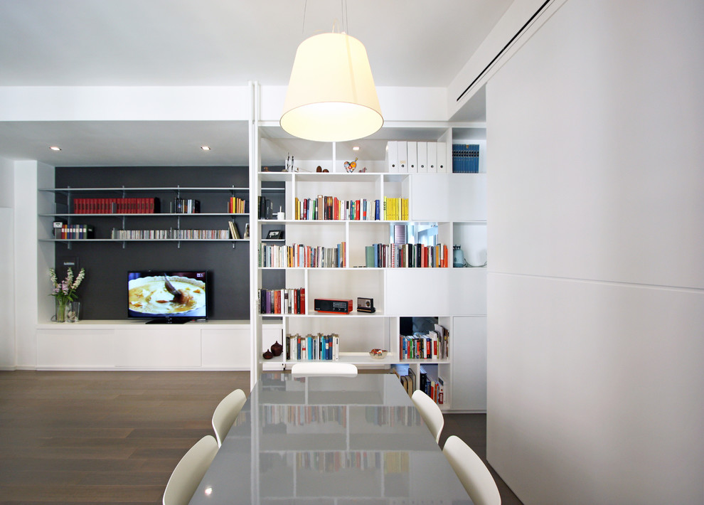 This is an example of a small modern dining room in Rome.
