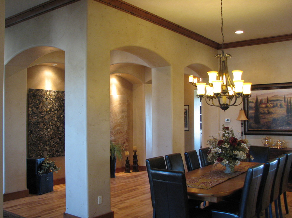 Example of a transitional dining room design in Boise
