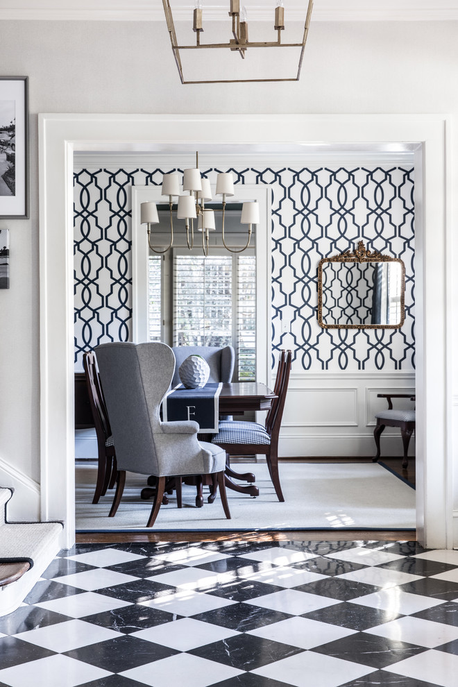 Inspiration for a classic dining room in Charlotte with white walls and marble flooring.
