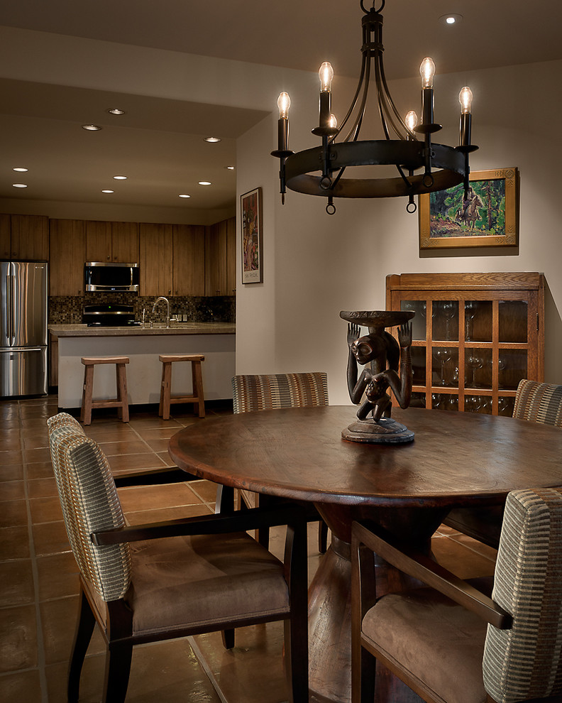 Kitchen/dining room combo - southwestern kitchen/dining room combo idea in Phoenix with white walls
