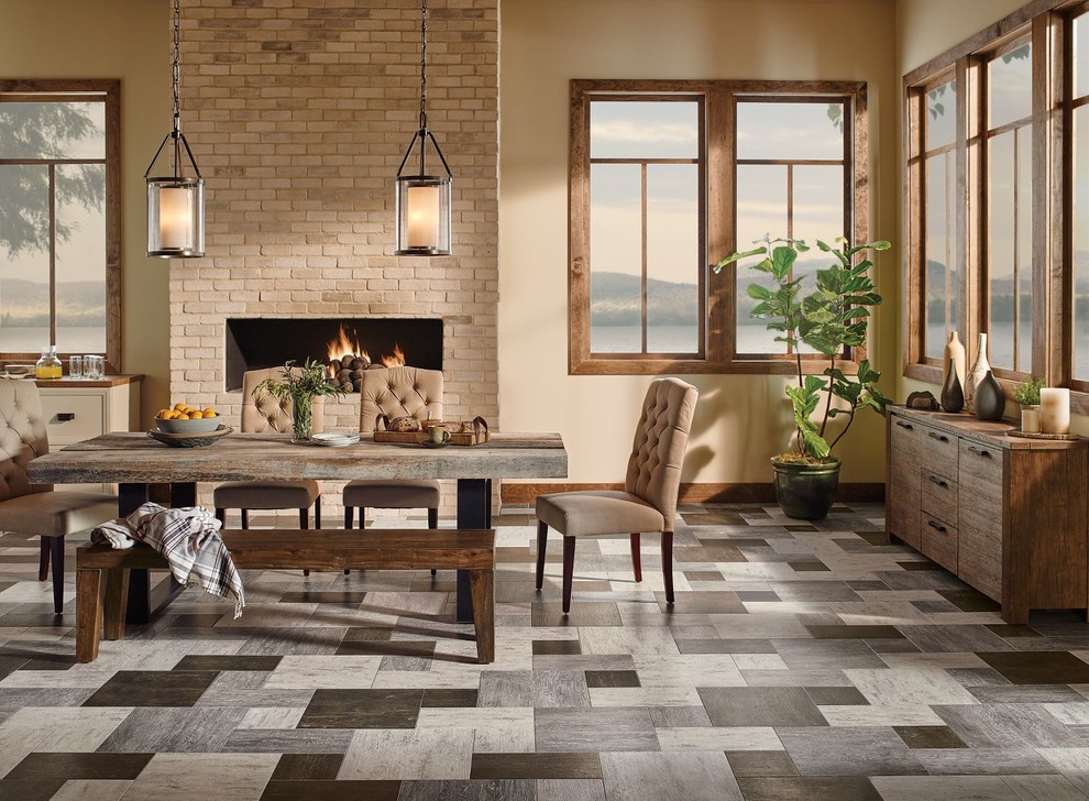 Example of a mid-sized mountain style slate floor great room design in Other with beige walls, a ribbon fireplace and a brick fireplace
