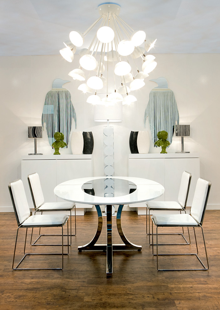 Inspiration for a contemporary dark wood floor dining room remodel in Miami with white walls