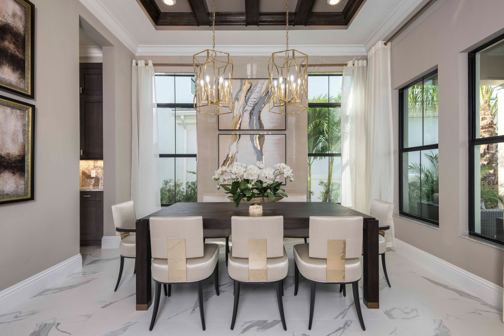 Transitional porcelain tile, white floor and wood ceiling kitchen/dining room combo photo in Miami with beige walls