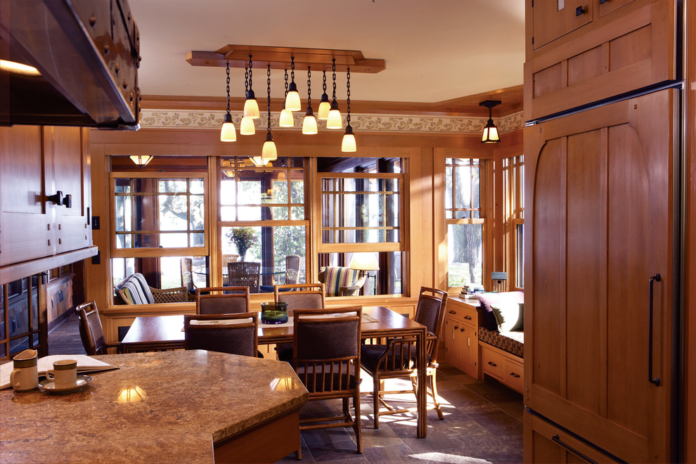 Photo of a traditional kitchen/dining room in Minneapolis with slate flooring.