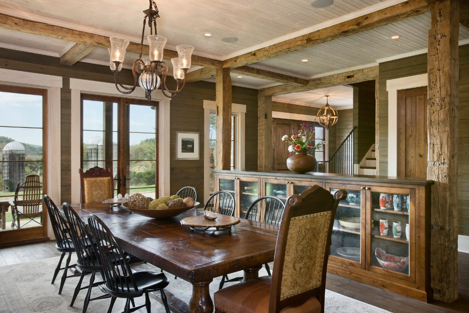 Photo of a large rural enclosed dining room in Other with green walls, dark hardwood flooring and no fireplace.