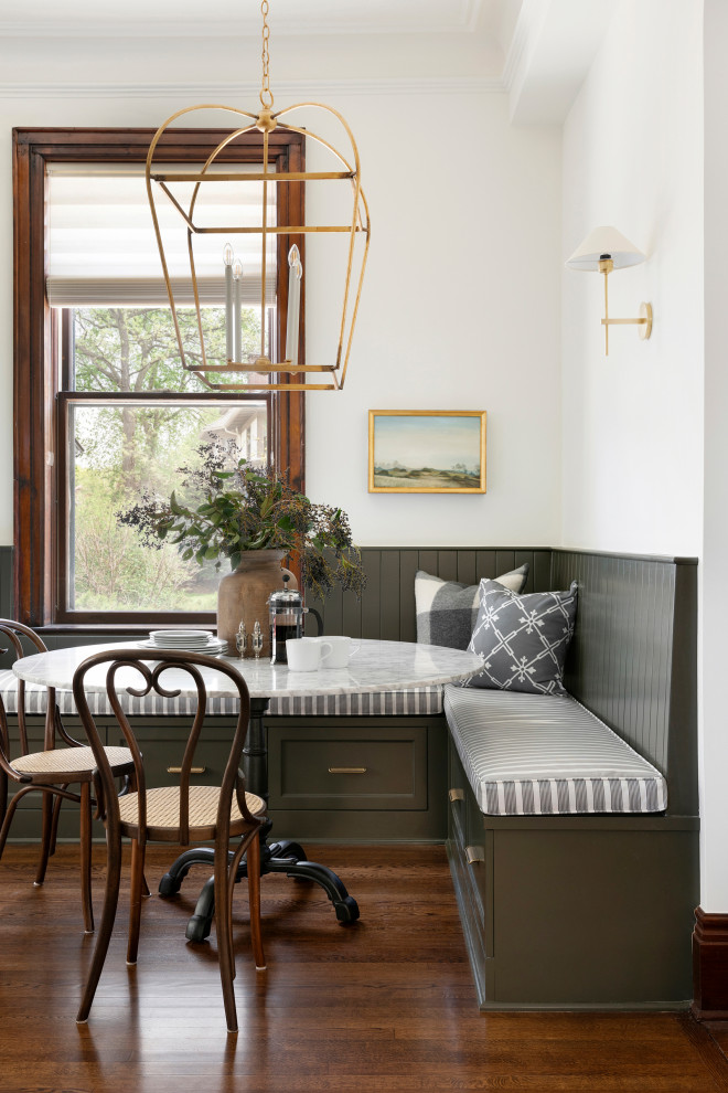 Example of a classic dark wood floor and brown floor dining room design in Minneapolis with white walls