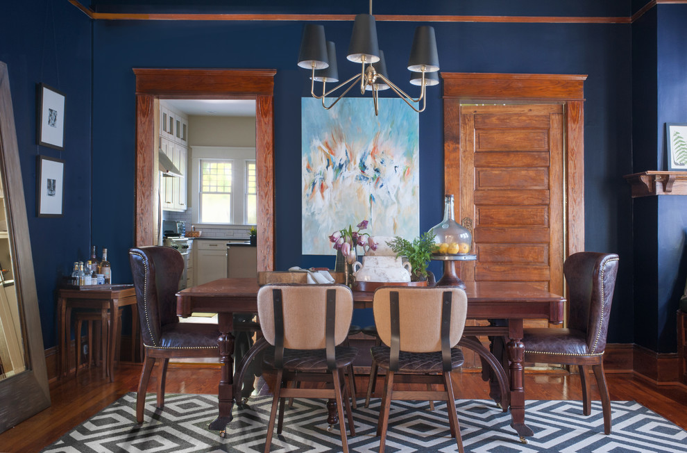 Inspiration for a mid-sized eclectic enclosed dining room remodel in Atlanta with blue walls
