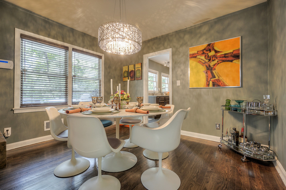 Small trendy dark wood floor enclosed dining room photo in Atlanta with multicolored walls