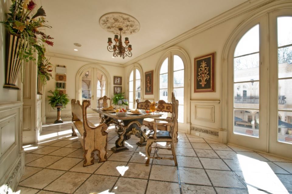 Example of a tuscan dining room design in Atlanta