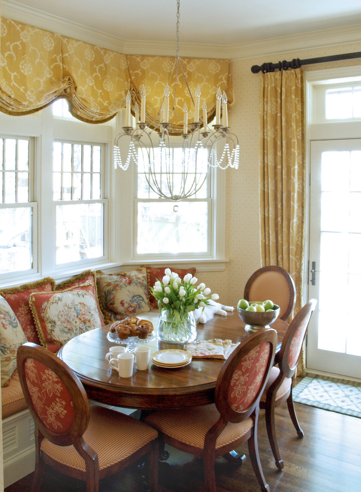 Photo of a victorian dining room in Philadelphia with beige walls and dark hardwood flooring.