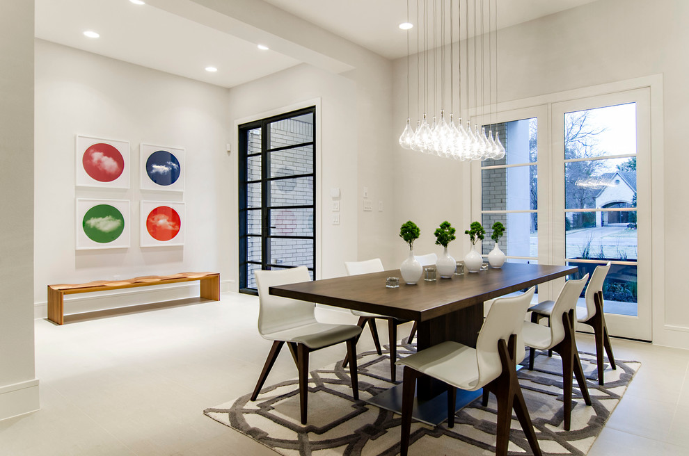Photo of a contemporary dining room in Dallas with white walls.
