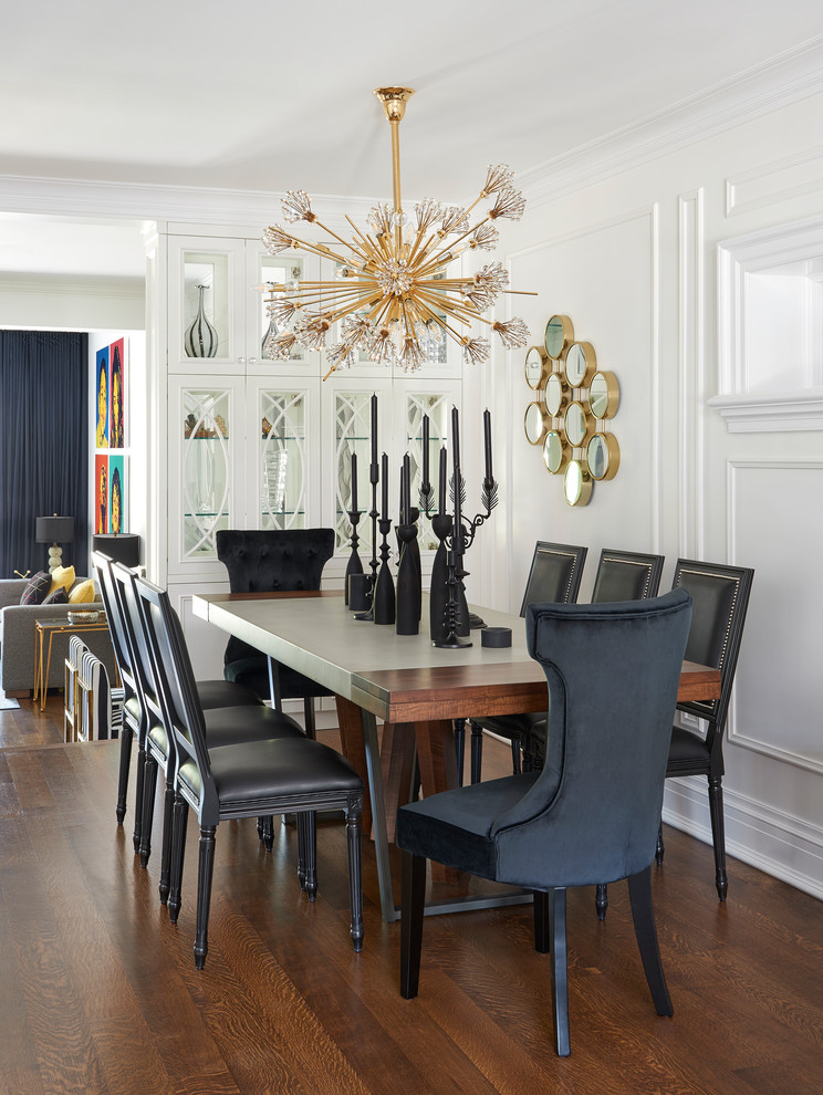 Photo of a traditional dining room in Toronto with white walls and dark hardwood flooring.