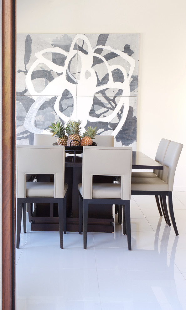 Photo of a medium sized contemporary enclosed dining room in Brisbane with beige walls.