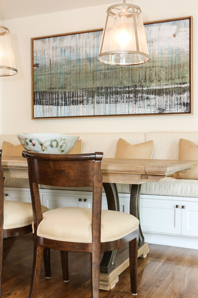 Medium sized classic open plan dining room in Los Angeles with white walls, medium hardwood flooring, a standard fireplace and a stone fireplace surround.