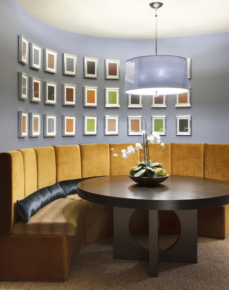 Inspiration for a contemporary dining room remodel in Chicago with purple walls