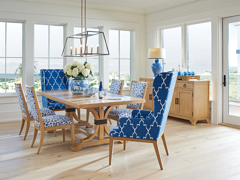 Nautical dining room in Los Angeles with feature lighting.