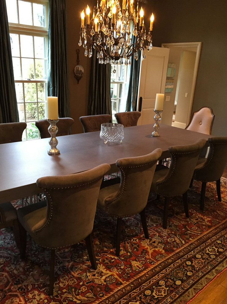 This is an example of a medium sized classic enclosed dining room in Other with brown walls, carpet, no fireplace and brown floors.