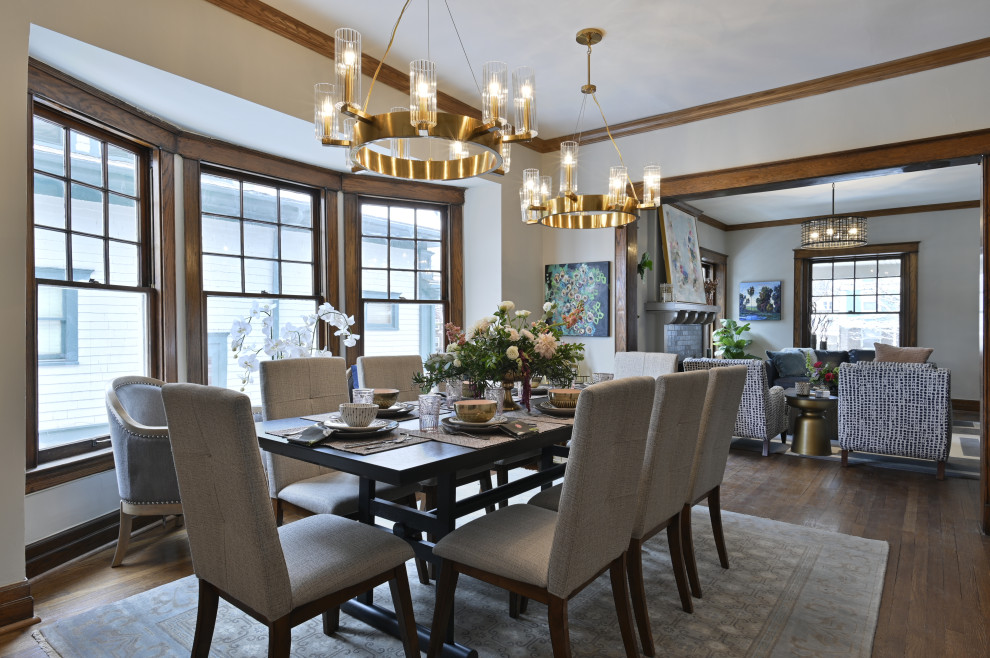 Example of a transitional dark wood floor and brown floor dining room design in Omaha with gray walls