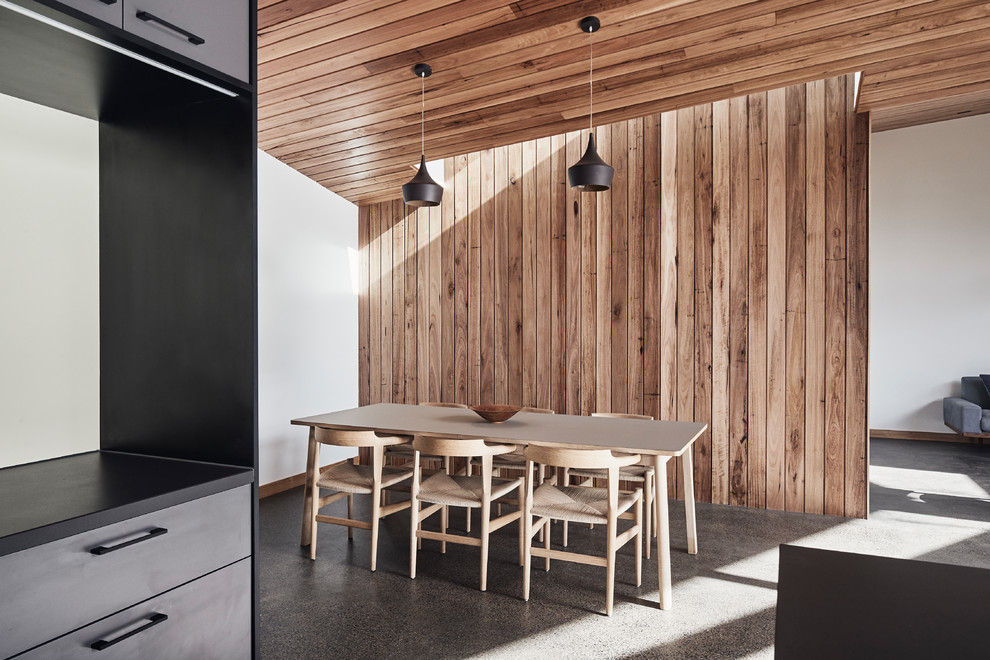 Offenes, Mittelgroßes Modernes Esszimmer mit Betonboden und grauem Boden in Melbourne