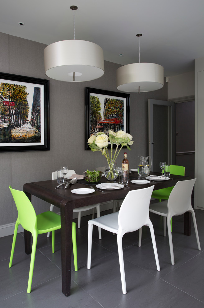 Example of a trendy dining room design in London with gray walls