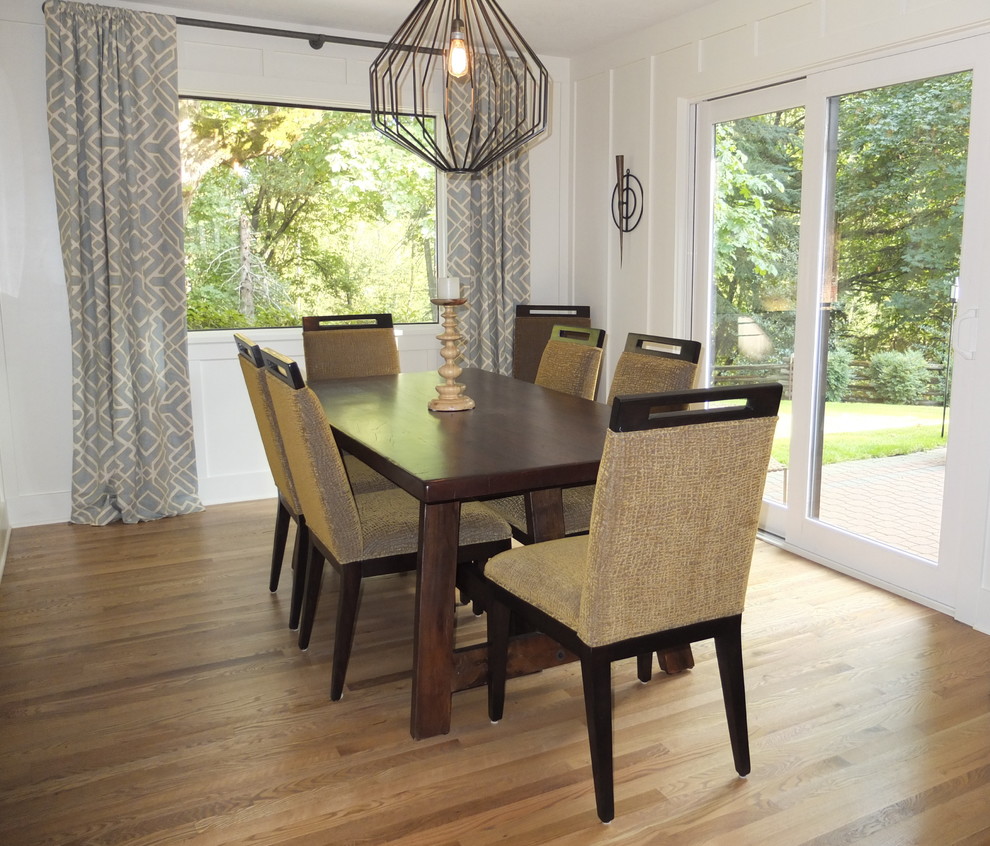Example of a cottage dining room design in Portland